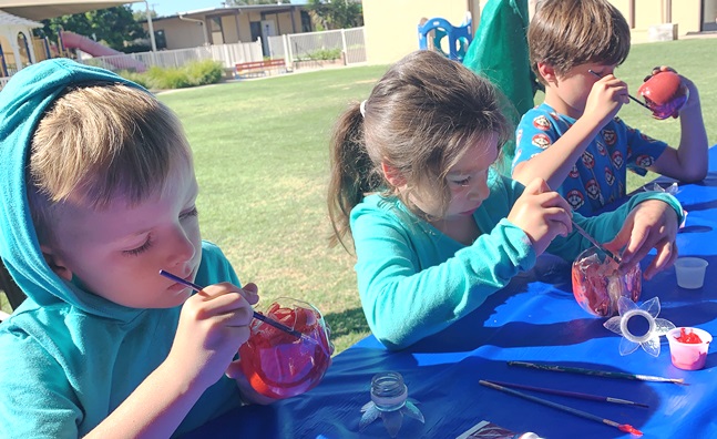 Making pomegranite lights for the sukkah-scaled