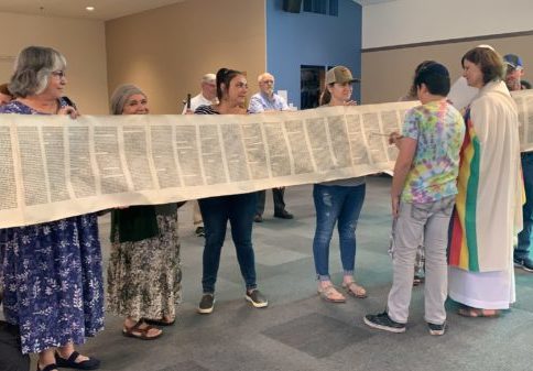 Student Reading from Torah on Simchat Torah